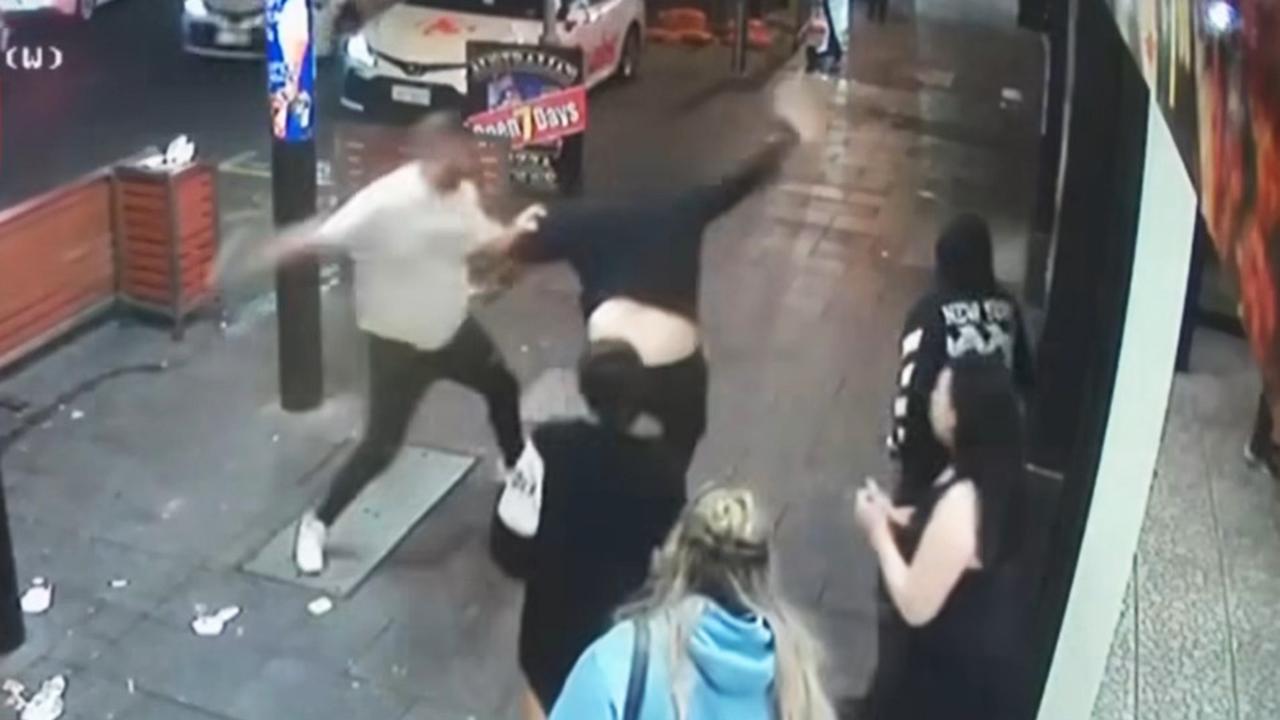 Mr Sansbury-Weetra (white T-shirt) outside Falafel House in Hindley Street. Picture: 7NEWS Adelaide