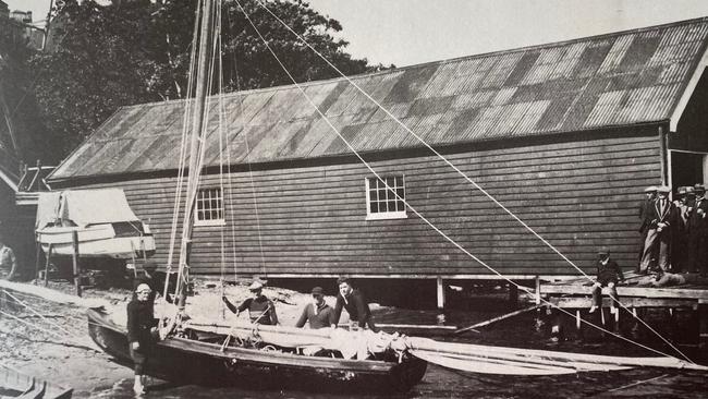 The man at the back of the boat is ferry master Philp Barnett's grandfather, Sid Barnett Jnr. Picture: Supplied