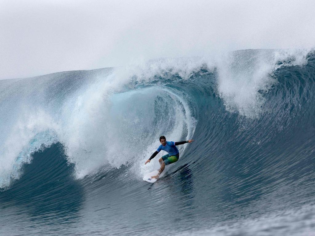 Jack Robinson of Team Australia rides a wave during round three of surfing on day three of the Olympic Games in Teahupo'o, French Polynesia. Picture: Ed Sloane / POOL / AFP.