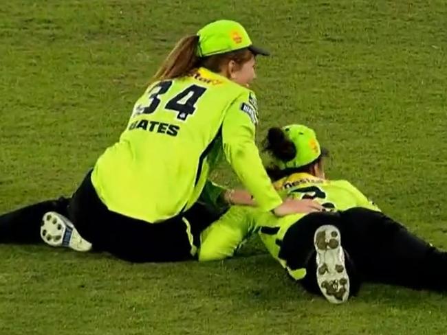 Players duck for cover as the plovers swoop during a WBBL match. Pic: Fox Sports