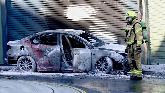 Aftermath... A burnt out car believed to be connected to the shooting. Picture: Jeremy Piper