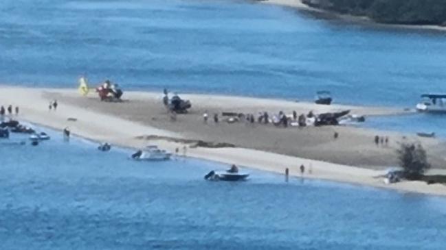 Emergency services at the scene of a two-helicopter collision at Main Beach near Sea World. Picture: Jonathan Gyde