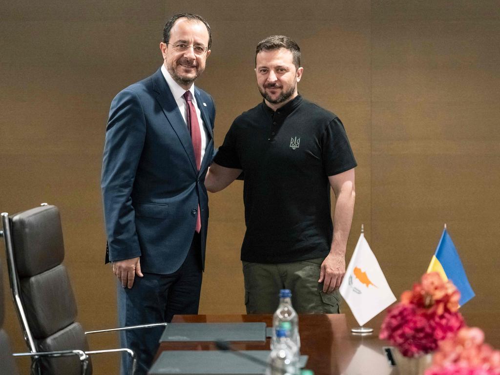 Cypriot President Nikos Christodoulides with Ukrainian President Volodymyr Zelenskyy on the sidelines of a summit on peace in Ukraine. Picture: AFP