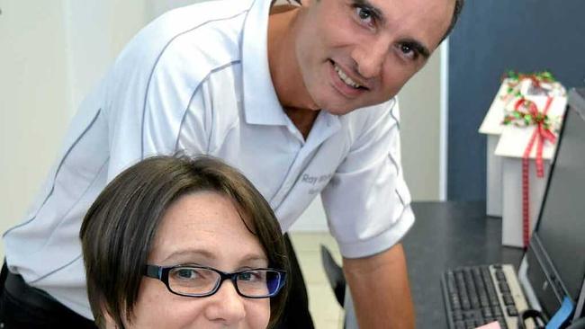 ACHIEVEMENT: Ray White Mackay City owner Chris Laval with Toni Wales at the office. Picture: Louise Starkey