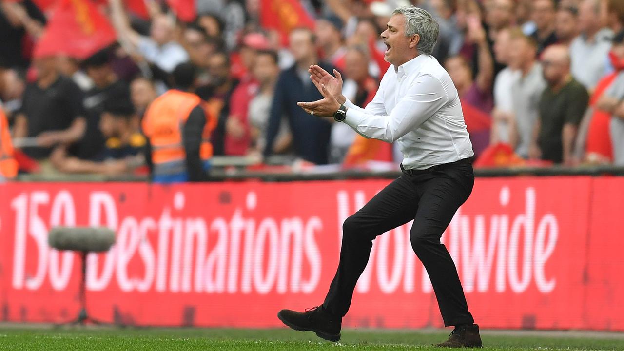 Manchester United's Portuguese manager Jose Mourinho shouts from the touchline.