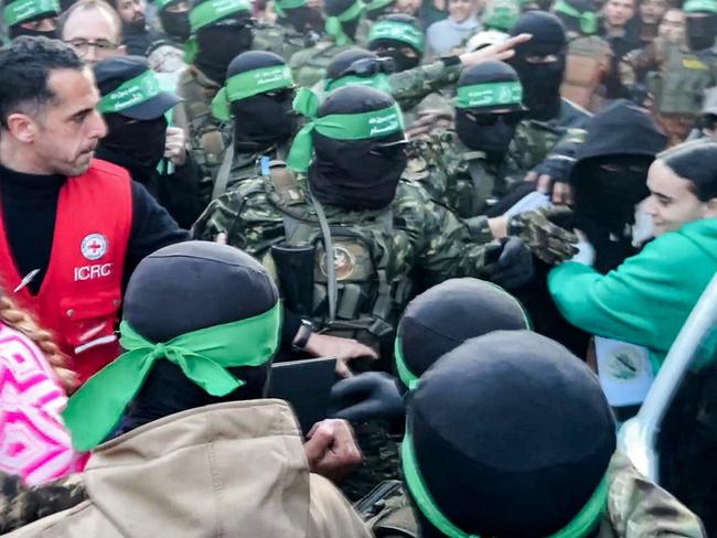 Emily Damari exits a vehicle to be handed over to the International Committee of the Red Cross (ICRC) during the hostage-prisoner exchange operation in Saraya Square in western Gaza City. Picture: AFP