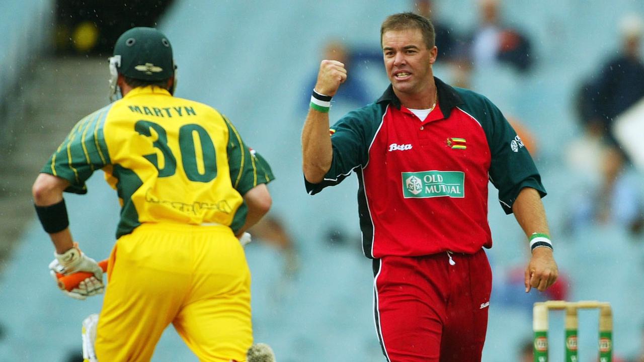 Streak (right) was a major foe for Australia and the rest of world cricket throughout the 1990s. (Photo by Hamish Blair/Getty Images)