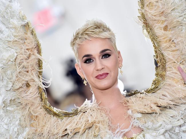 Perry at yesterday’s MET Gala. Maybe those angel wings got her in some kinda mood. Picture: MEGA