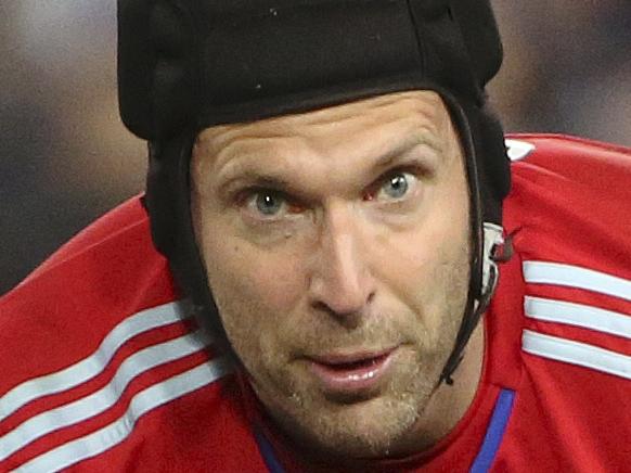 Chelsea's goalkeeper Petr Cech, right, checks on injured Sydney FC player George Blackwood at the end of their friendly soccer match in Sydney, Tuesday, June 2, 2015. (AP Photo/Rick Rycroft)