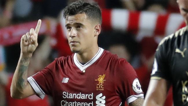FILE - In this Saturday, July 22, 2017 file photo, Liverpool's Philippe Coutinho celebrates after scoring a goal during the final match against Leicester City FC at the Premier League Asia Trophy soccer tournament in Hong Kong. Liverpoolâ€™s American owners say Philippe Coutinho will not be sold in this transfer window, amid interest in the Brazil playmaker from Barcelona. In a short statement on Friday, Aug. 11, 2017, Fenway Sports Group say Liverpoolâ€™s â€œdefinitive stance is that no offers for Philippe will be considered.â€ (AP Photo/Kin Cheung, file)