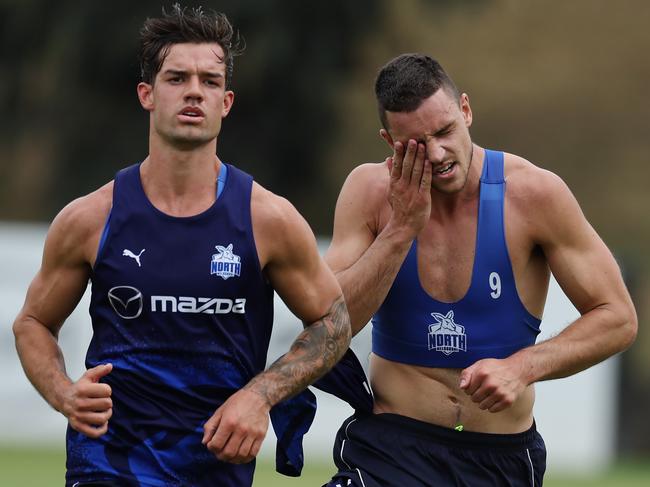 Jy Simpkin and Luke Davies-Uniacke on the track at North Melbourne. Picture: Michael Klein