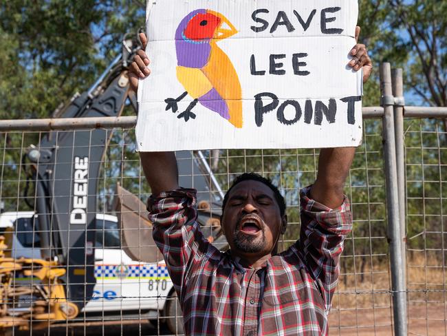 Protesters are picketing the Lee Point Defence Housing Australia Development as bulldozers move in on Stage 2 of the project. Picture: Pema Tamang Pakhrin