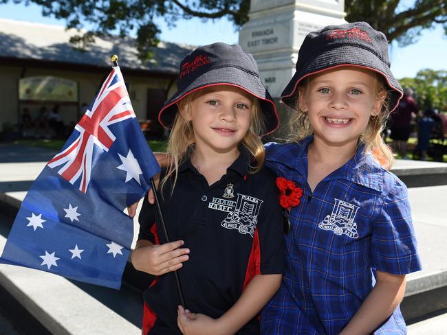 Anzac Day main service in Hervey Bay at Freedom Park. (L) Taleah, 5, and Crystal, 7, Hartung from Pialba State School.