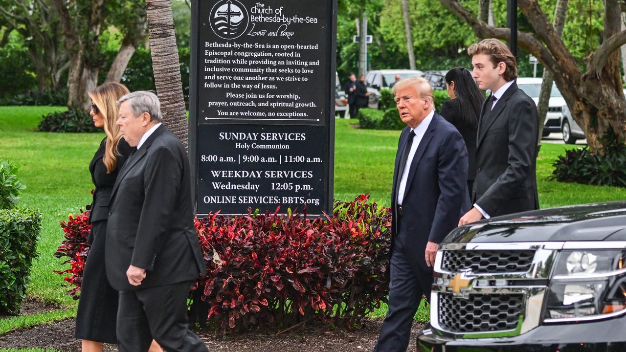 The Trumps at the funeral. (Photo by GIORGIO VIERA / AFP)