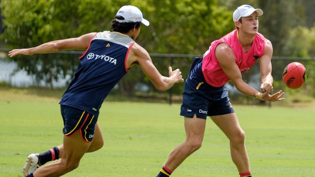 Adelaide’s reigning club champion Matt Crouch fires off a handball during a training camp on the Gold Coast last week. Picture: Adelaide Football Club.