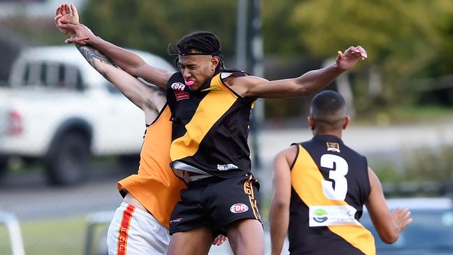 Jason Kenneth working hard in the ruck. Picture: Steve Tanner