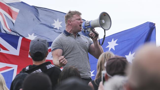 Blair Cottrell addressed the crowd at a 2019 far-right protest on St Kilda against African gang violence. Picture: by Wayne Taylor