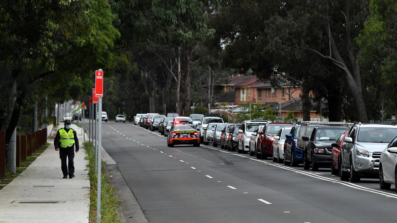 People queued in cars at the Fairfield Showground Covid testing site in Sydney. Picture: NCA NewsWire/Joel Carrett