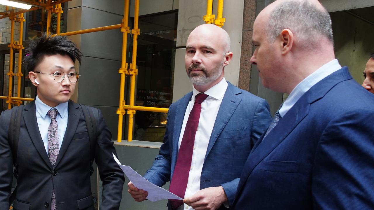 Mayfair 101 CEO, James Mawhinney seen leaving the Melbourne Magistrates Court while accompanied by lawyers, on Tuesday 9 April 2024. Picture: Luis Enrique Ascui