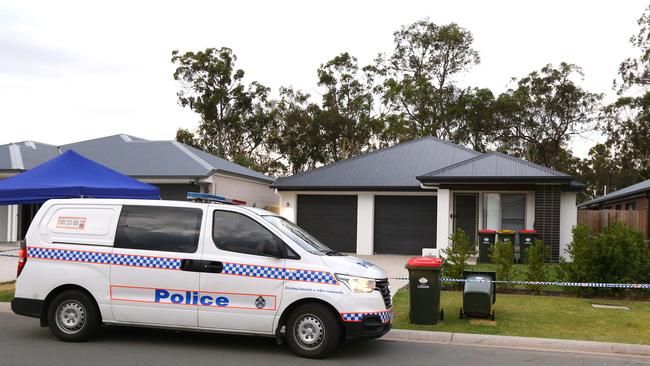 A crime scene has been established after a body was found during a welfare check to 10A and 10B Pierro Street, Logan Reserve Saturday 17th December 2022. Picture: David Clark