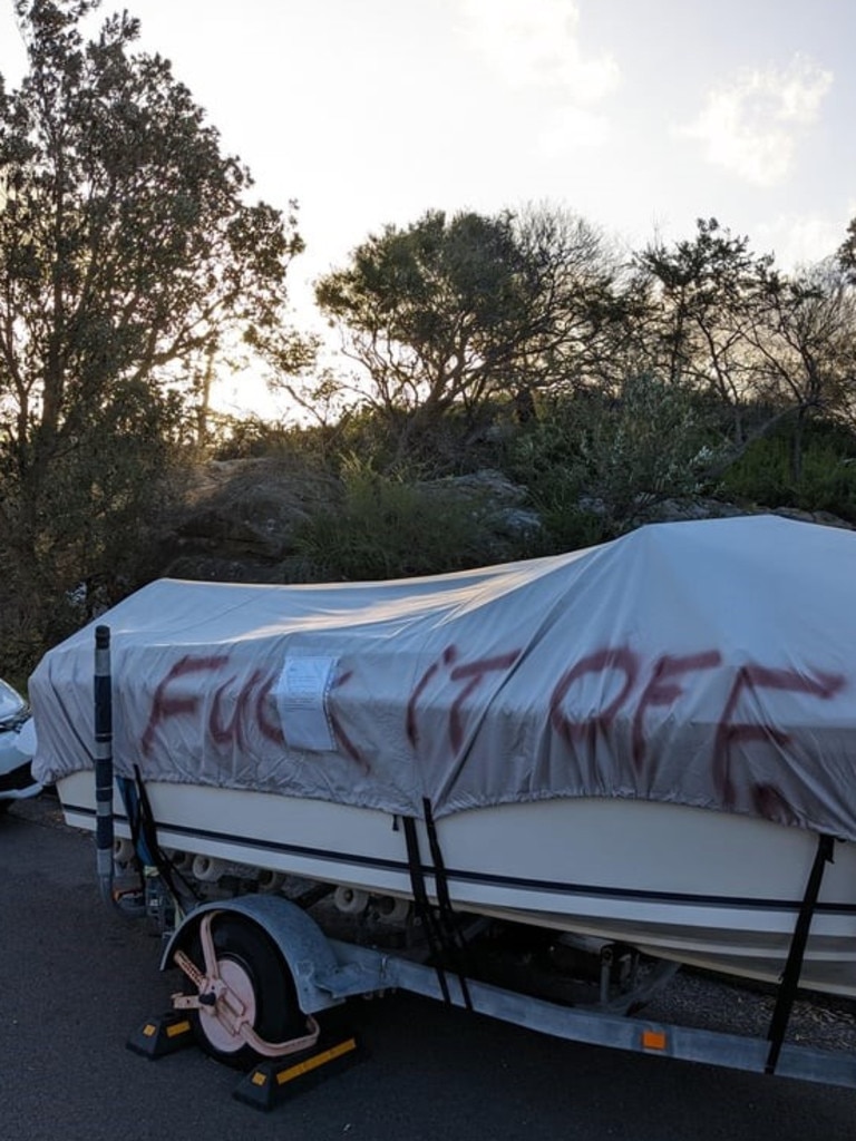 A neighbour dispute in Freshwater, a suburb in Sydney’s Northern Beaches, has taken a new turn as a local vandal spray-painted ‘F**k it off’ over a parked boat. Picture: Reddit