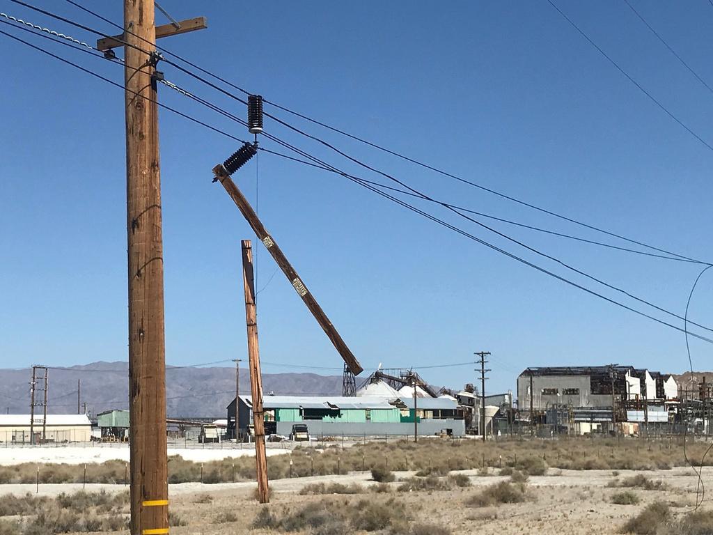 Utility poles are damaged in Trona. Picture: Matt Hartman