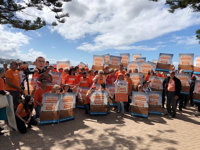 GetUp! volunteers in the federal electorate of Warringah gather at Manly Beach for the lobby group's national campaign launch. Picture: Jim O'Rourke