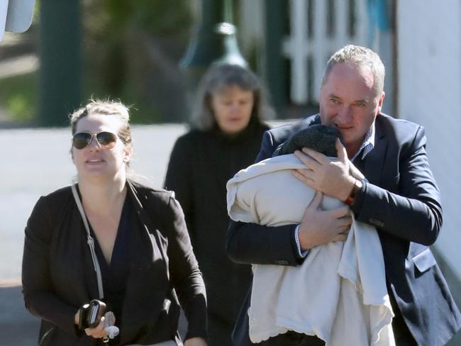 Barnaby Joyce and Vikki Campion take their new baby for a walk. Source: Diimex