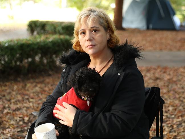 Kerry has spent sometime in the park in a tent with her dog Chelsea and cat. Picture John Grainger.