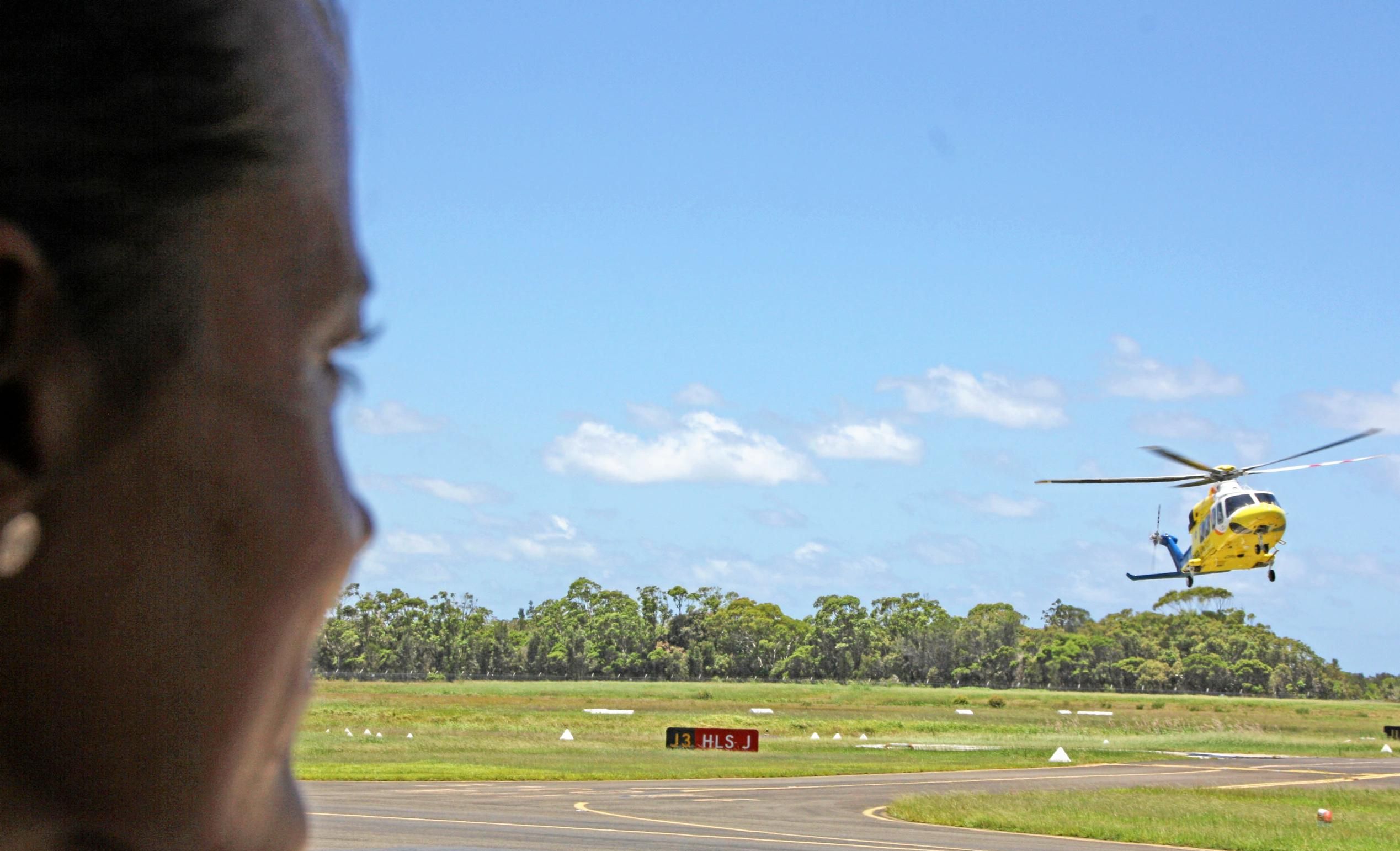 The RACQ LifeFlight Rescue Helicopter returns to the Sunshine Coast Airport hangar. Picture: Erle Levey