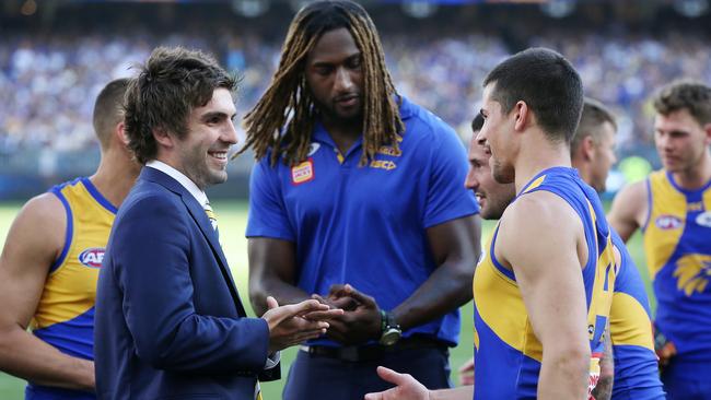 The suspended Andrew Gaff and injured Nic Naitanui congratulate teammates after the preliminary final win. Pic: Michael Klein