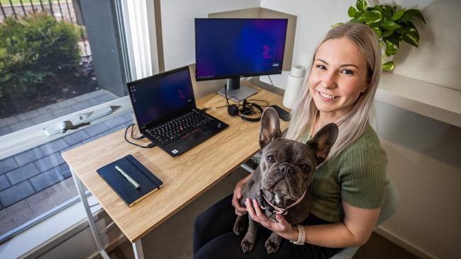 Avalon Kay with her dog Stella working from home. Picture: Tom Huntley