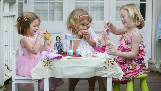 Kids playing deals with barbies