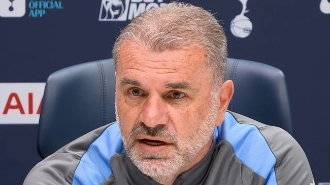 Ange Postecoglou speaks to reporters.
