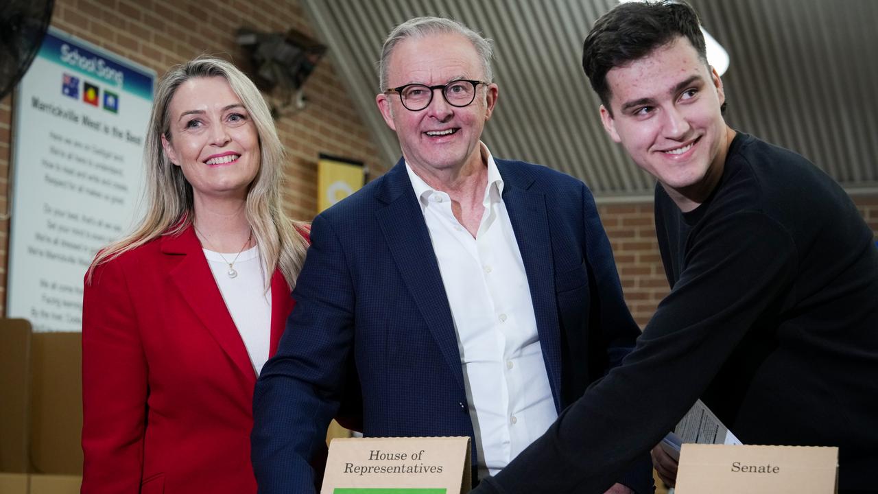 Anthony Albanese casts his ballot at Marrickville West Public School alongside his fiance, Jodie Haydon, and his son, Nathan. Picture: Asanka Ratnayake/Getty Images