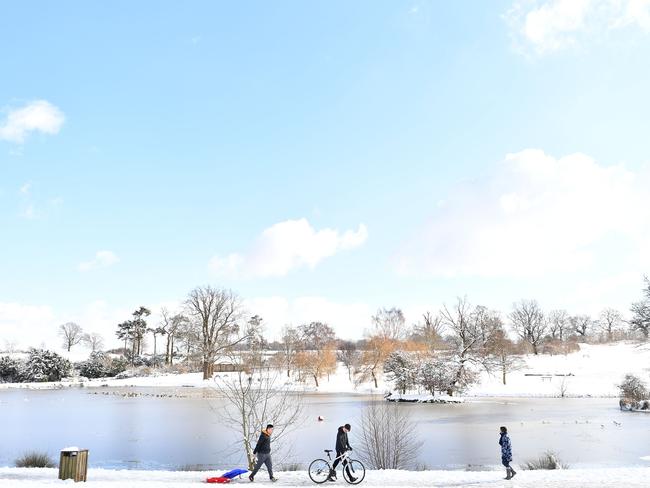 People go sledging in Dunorlan park in Tunbridge Wells following a heavy snowfall on February 27, 2018. A blast of Siberian weather sent temperatures plunging across much of Europe on Tuesday, causing headaches for travellers and leading to several deaths from exposure as snow carpeted palm-lined Mediterranean beaches. Picture: AFP