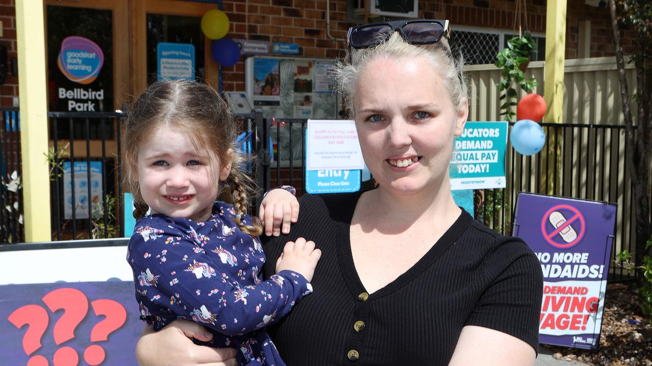 Crystal Bishell, picking up her daughter Miah, 3, from the Goodstart Bellbird Park. The educator said workers deserved better pay and working conditions Picture: Liam Kidston