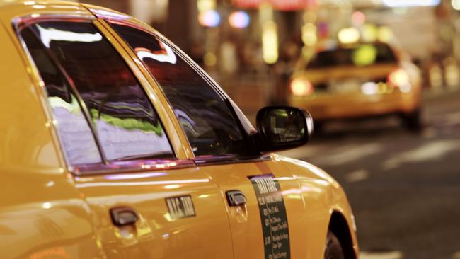 Taxis driving through times square in New York city