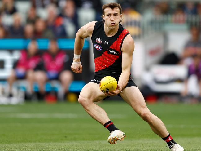 Andy McGrath weighs up a handball. Picture: Michael Willson/AFL Photos