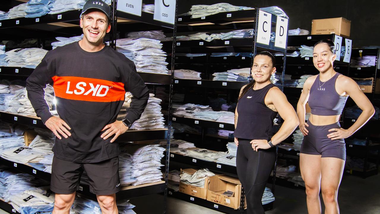 QBW Picture LSKD founder and CEO Jason Daniel at his warehouse with staff Kristi Malouf and Kitahna Huata.Picture: NIGEL HALLETT