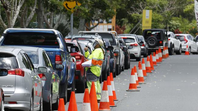 Huge lines of cars continue at the Covid testing site at Murarrie, where local businesses are struggling because of the increased traffic. Picture: Lachie Millard