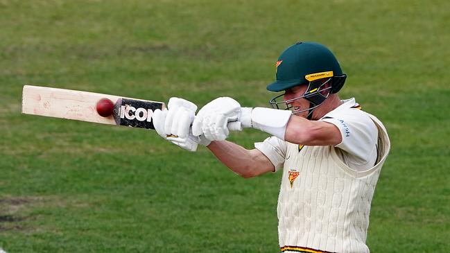 Tigers batsman Jordan Silk hits to the boundary on day 3 of the Marsh Sheffield Shield cricket match between the Tasmanian Tigers and the NSW Blues at Blundstone Arena in Hobart. Picture: AAP IMAGE/DAVE HUNT