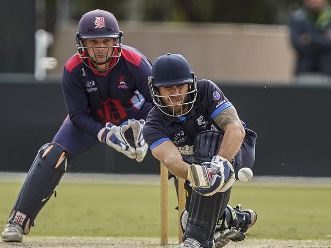 Jacques Augustin behind the sticks in the grand final against Prahran. Picture: Valeriu Campan