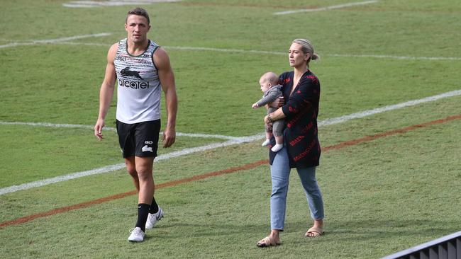 Together but apart: Sam Burgess and Phoebe Burgess at Redfern Oval in Redfern. Picture: Richard Dobson