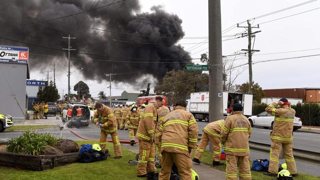 Firefighters prepare to work on the giant West Footscray factory fire. Photo: William West/ AFP