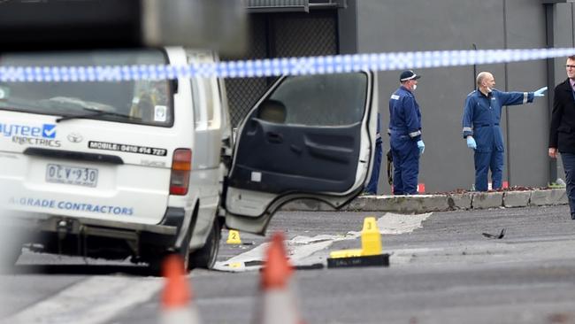 Forensic investigators at the crime scene at Carrick drive. Picture: Nicole Garmston