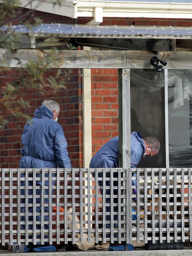 Tasmania Police forensic officers at the crime scene, Shane Geoffrey Barker’s Campbell Town home in 2009.