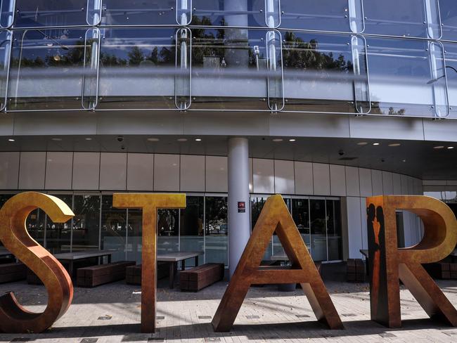 A sign stands outside The Star casino and event centre in Sydney on September 2, 2024. Troubled resort and casino operator Star Entertainment was temporarily delisted from the Australian Securities Exchange on September 2 after failing to post its annual financial results. (Photo by DAVID GRAY / AFP)