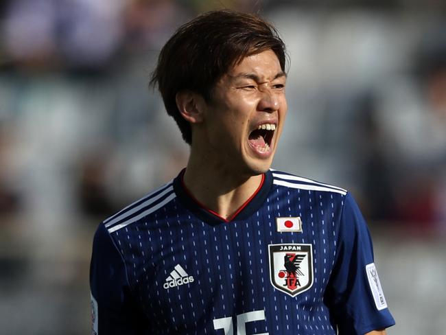 ABU DHABI, UNITED ARAB EMIRATES - JANUARY 09: Yuya Osako of Japan reacts after a missed chance during the AFC Asian Cup Group F match between Japan and Turkmenistan at Al Nahyan Stadium on January 09, 2019 in Abu Dhabi, United Arab Emirates. (Photo by Francois Nel/Getty Images)