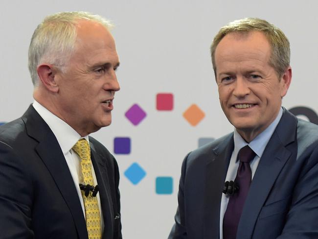 Australian Prime Minister Malcolm Turnbull and Australian Opposition Leader Bill Shorten shake hands during a leaders debate hosted by Facebook Australia and News.com.au in Sydney, Friday, June 17, 2016. (AAP Image/Lukas Coch/POOL) NO ARCHIVING